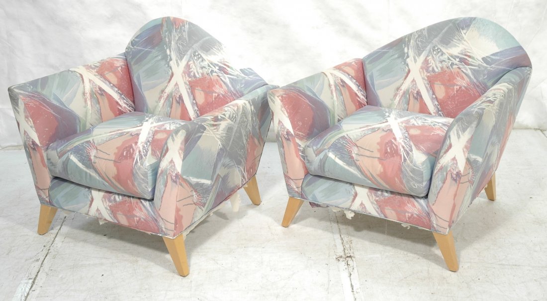 DIRECTIONAL Upholstered Lounge Chairs. 70's era u: DIRECTIONAL Upholstered Lounge Chairs. 70's era upholstered arm chairs with asymmetrical bowed backs. Labels. -- Dimensions: H: 33 inches: W: 35 inches: D: 30 inches ---