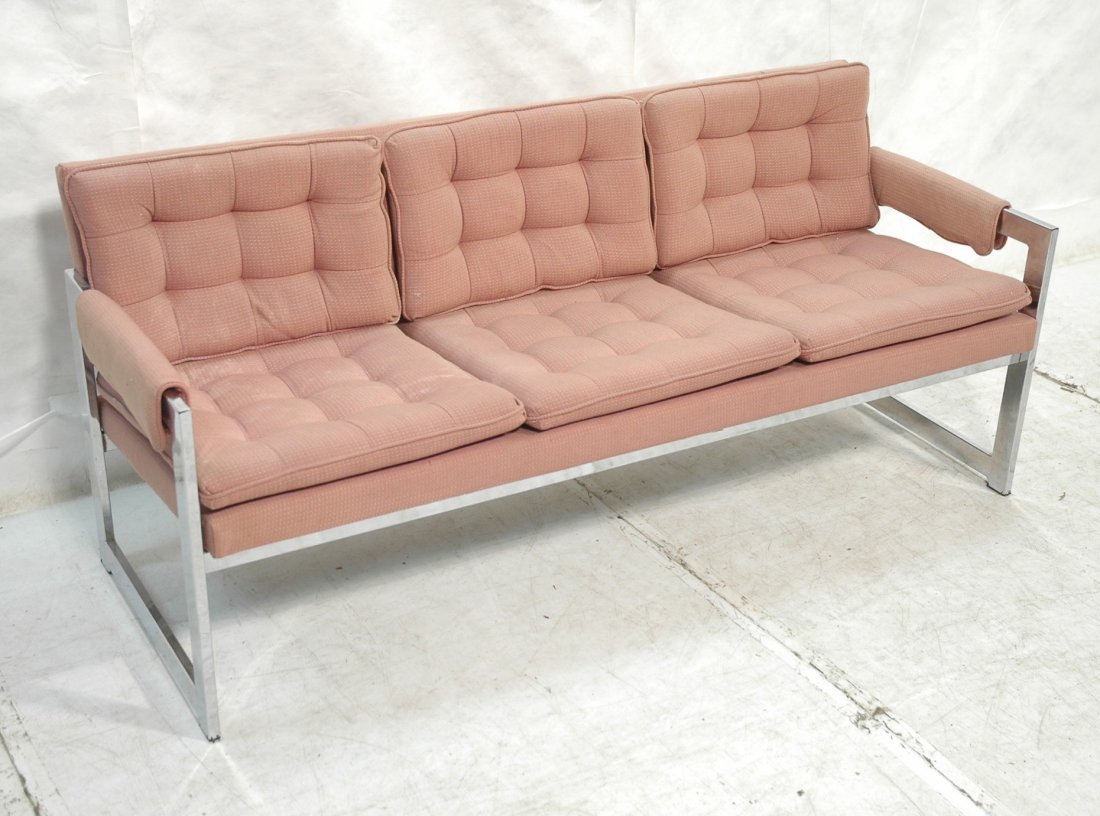 MILO BAUGHMAN style Sofa Couch. Wide flat chrome: MILO BAUGHMAN style Sofa Couch. Wide flat chrome frames. Peach upholstery. -- Dimensions: H: 29 inches: W: 66 inches: D: 26 inches ---