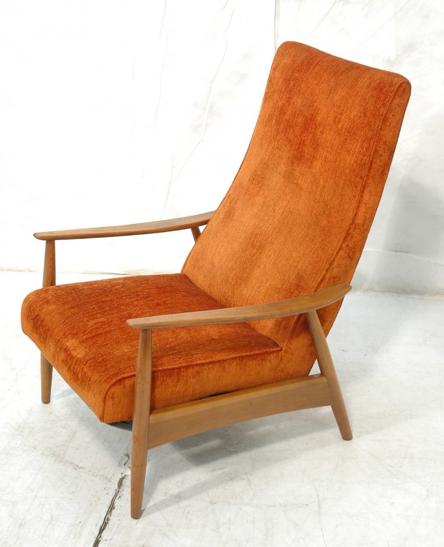 Milo Baughman attributed Reclining Lounge Chair.: Milo Baughman attributed Reclining Lounge Chair. Orange plush upholstery. Black vinyl foot rest. JAMES INC Label. -- Dimensions: H: 41.5 inches: W: 29 inches: D: 28.5 inches ---