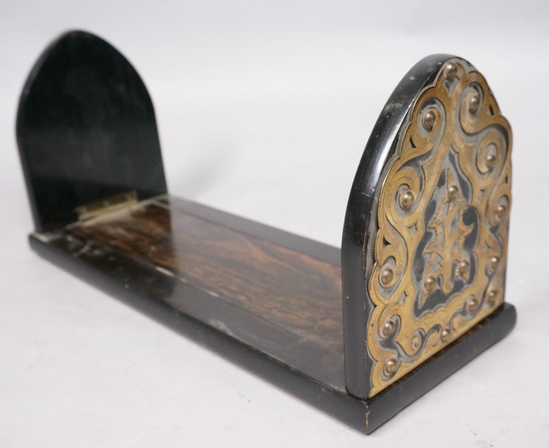 Victorian Rosewood and brass Book Holder. Booken: Victorian Rosewood and brass Book Holder. Bookends. Riveted cut brass work. Adjustable.-- Dimensions: H: 7 inches: W: 13 inches: D: 5 inches --- US Shipping charge: $20