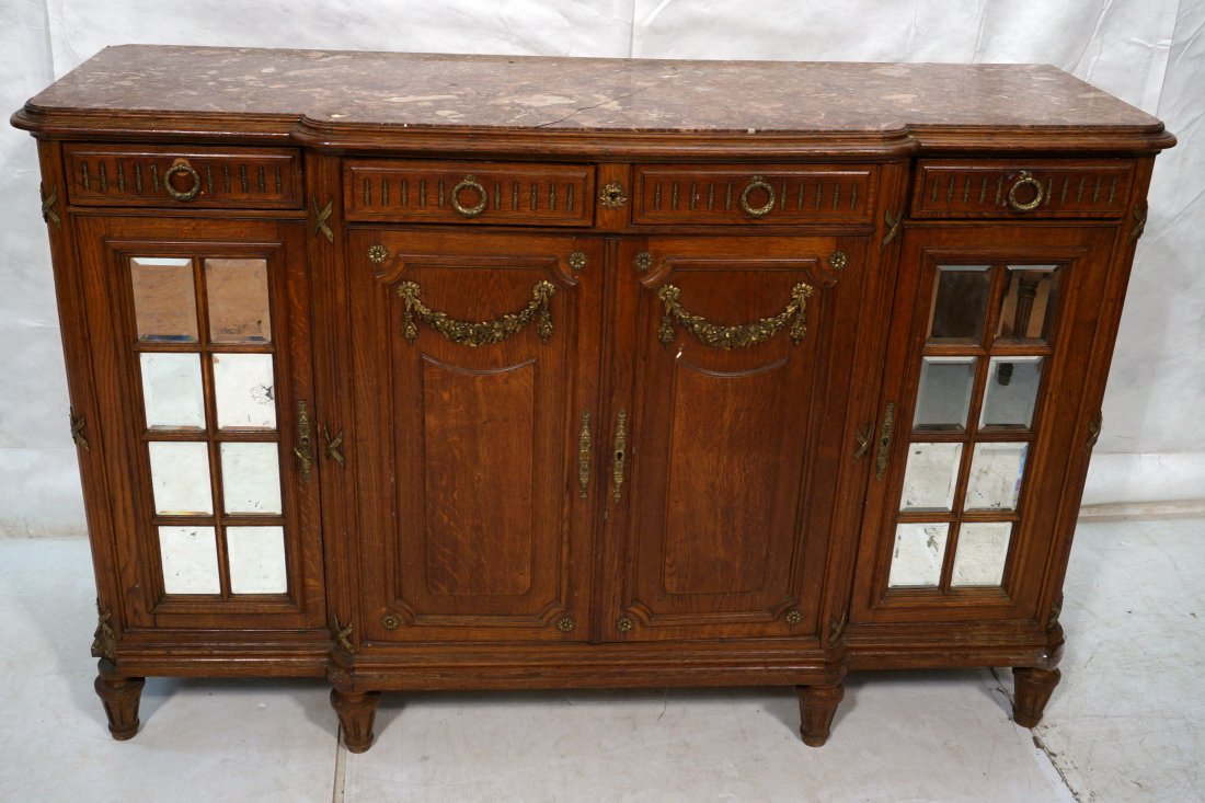 Marble Top French Empire Style Sideboard Buffet.: Marble Top French Empire Style Sideboard Buffet. Bronze Mounts. Beveled mirror panels to two doors.-- Dimensions: H: 43.5 inches: W: 66 inches: D: 21.5 inches ---