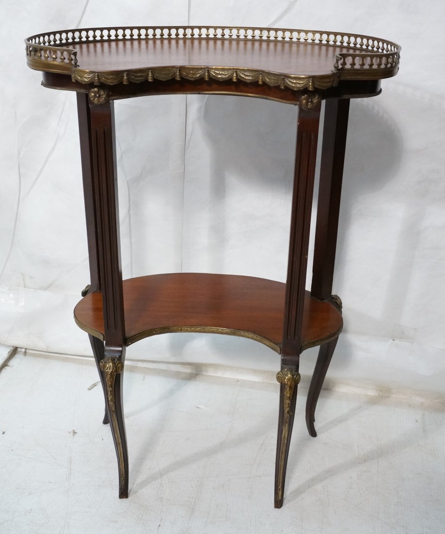Bronze Mounted French style Kidney Table. Brass g: Bronze Mounted French style Kidney Table. Brass gallery top. Mahogany. -- Dimensions: H: 31.25 inches: W: 22 inches: D: 13 inches ---