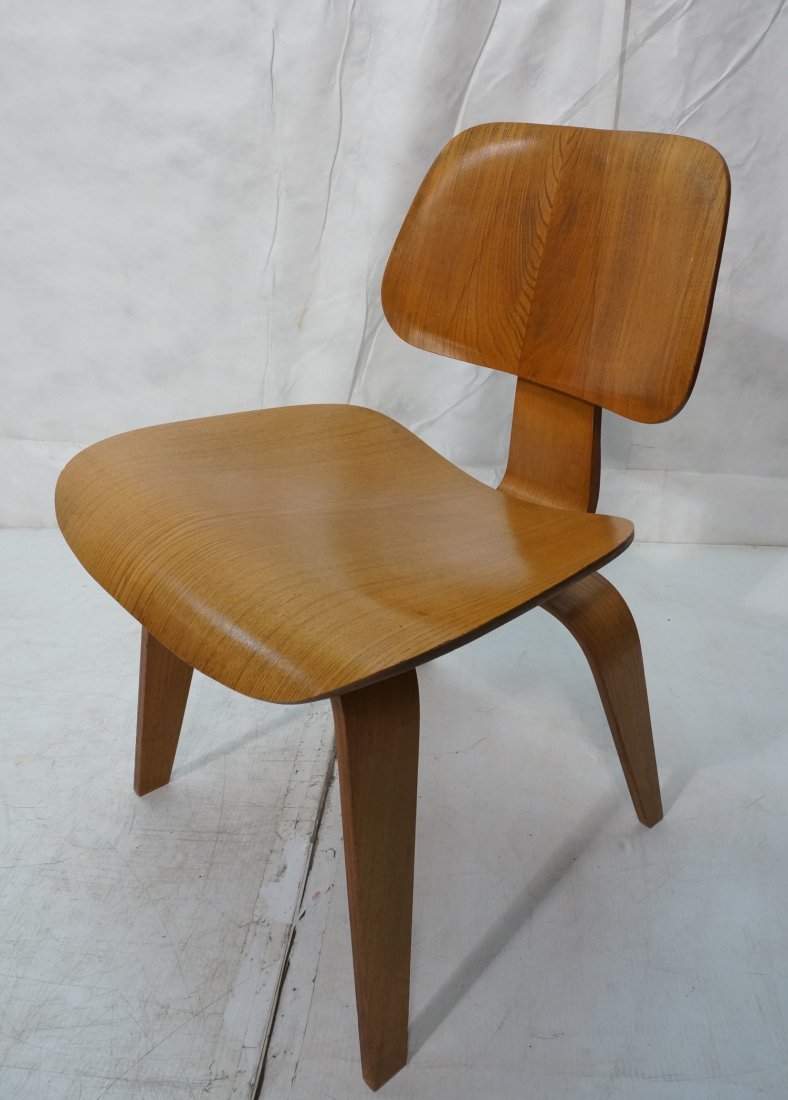 Early CHARLES EAMES Molded Plywood DCW Chairs. KN: Early CHARLES EAMES Molded Plywood DCW Chairs. KNOLL. Early Evans label. 1940's-- Dimensions: H: 29 inches: W: 19.25 inches: D: 22.25 inches ---
