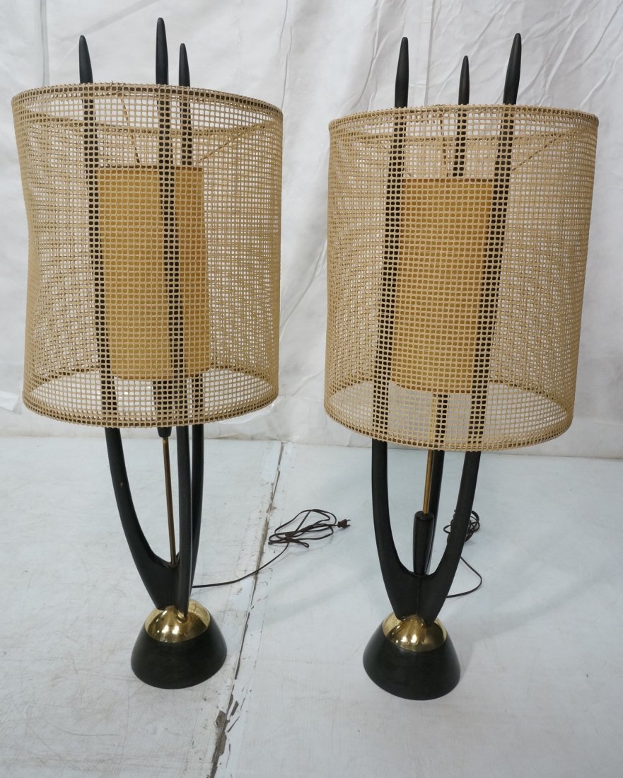 Pair American Modern Ebonized Wood and Brass Tabl: Pair American Modern Ebonized Wood and Brass Table lamps. 3 tall black arms support velum shade. Pierced fiber outer shade. -- Dimensions: H: 41 inches: W: 15 inches ---
