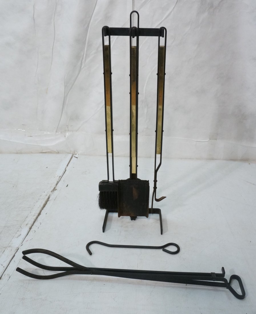Modernist Donald Deskey style Fireplace Tools. Bl: Modernist Donald Deskey style Fireplace Tools. Black iron column supports brass trimmed fireplace tools. Hooks for three tools. Extra tools. -- Dimensions: H: 32 inches: W: 9.5 inches: D: 6 inches ---