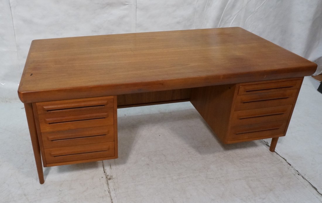 Danish Modern Teak Partners Desk. 8 Drawers. Othe: Danish Modern Teak Partners Desk. 8 Drawers. Other side has 2 locked cabinets & bookshelf. Banded top. Not marked. Unique leg support structure. -- Dimensions: H: 28.5 inches: W: 64.75 inches: D: 33.5