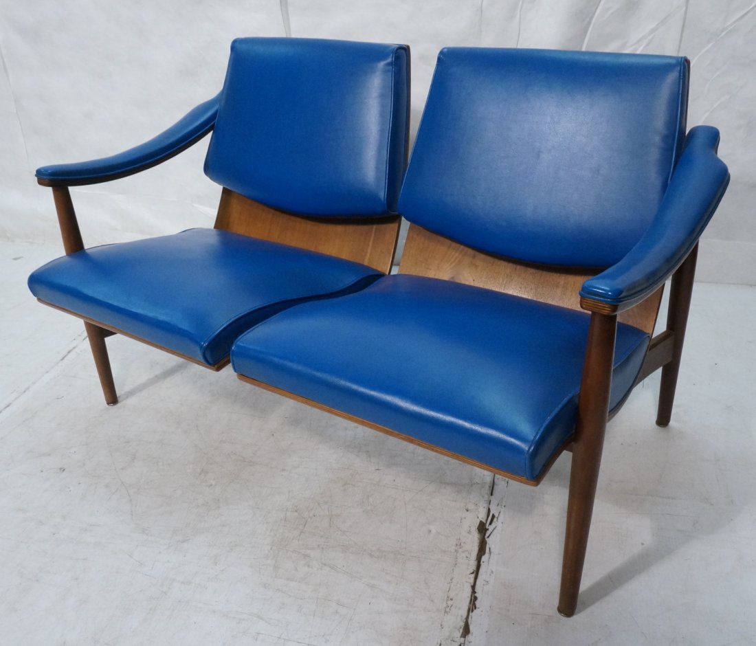 THONET Blue Vinyl Laminated Wood Settee. Upholste: THONET Blue Vinyl Laminated Wood Settee. Upholstered seat, back & arms. Tapered peg legs. Marked.-- Dimensions: H: 30.5 inches: W: 50 inches: D: 28 inches ---