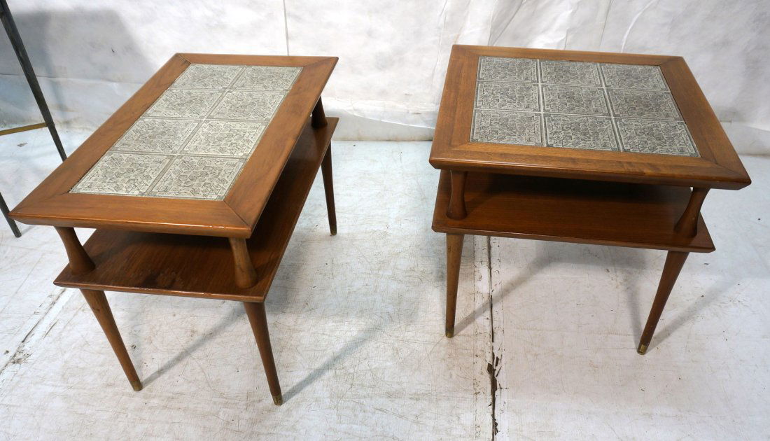 Two American Modern Walnut & Tile Side Tables. In: Two American Modern Walnut & Tile Side Tables. Inset 6" ceramic glazed tiles. Lower shelves. One square table. One is rectangular. Shaped & tapered peg legs. Not marked.-- Dimensions: H: 22 inches: W: