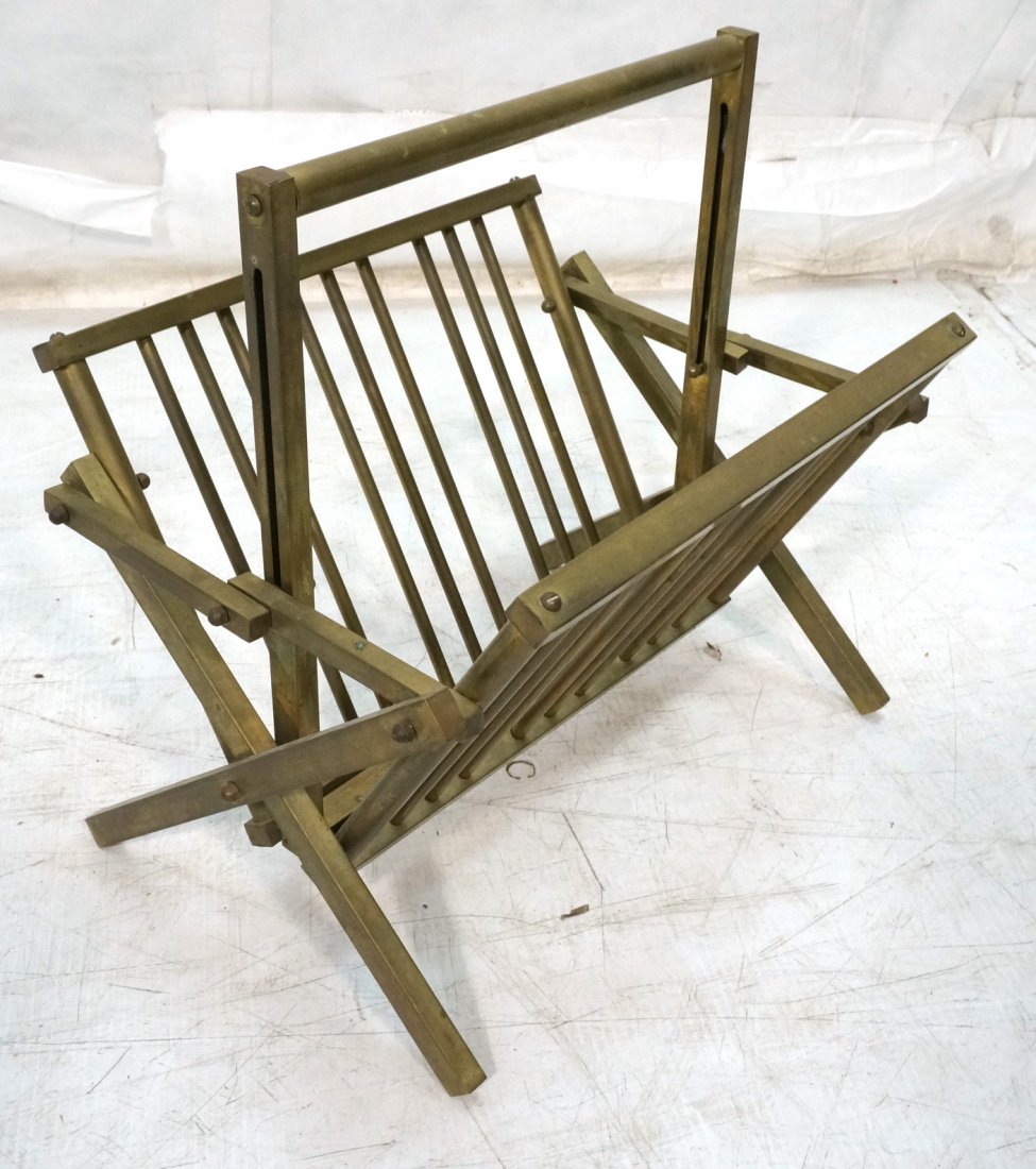 Modernist Brass Magazine Rack. Folding Model with: Modernist Brass Magazine Rack. Folding Model with Brass Spindles. -- Dimensions: H: 17.5 inches: W: 16.5 inches: D: 13 inches ---