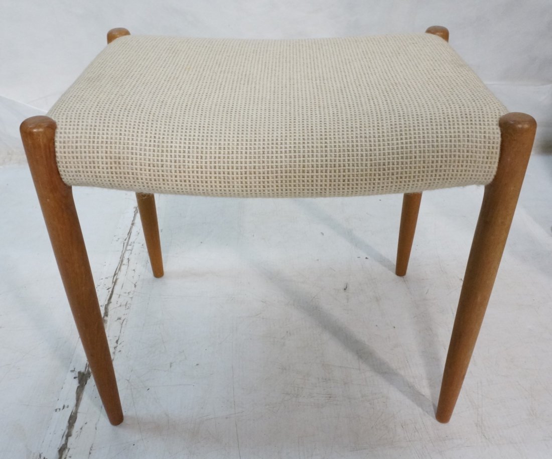 J.L. MOLLER MODELS Danish Modern Teak Stool. Oatm: J.L. MOLLER MODELS Danish Modern Teak Stool. Oatmeal fabric seat. Tapered peg legs. Marked.-- Dimensions: H: 18 inches: W: 20 inches: D: 14 inches ---
