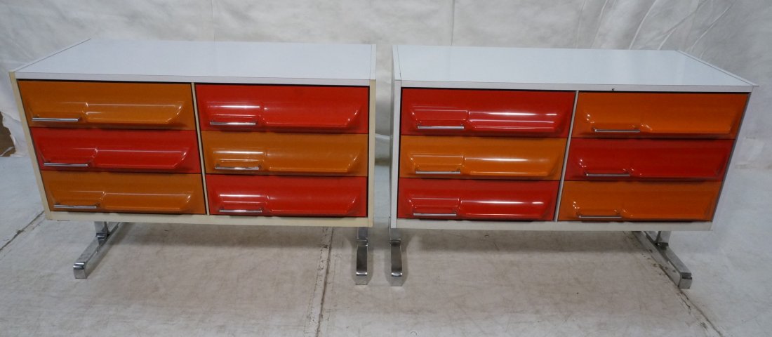 3pcs RAYMOND LOEWY style Bachelors Chests (Pair).: 3pcs RAYMOND LOEWY style Bachelors Chests (Pair). WITH drop door cabinet. TRECO Canada. Colored molded plastic drawers. White laminate frame. Flat wide chrome legs. Drawers with chrome metal pulls. --