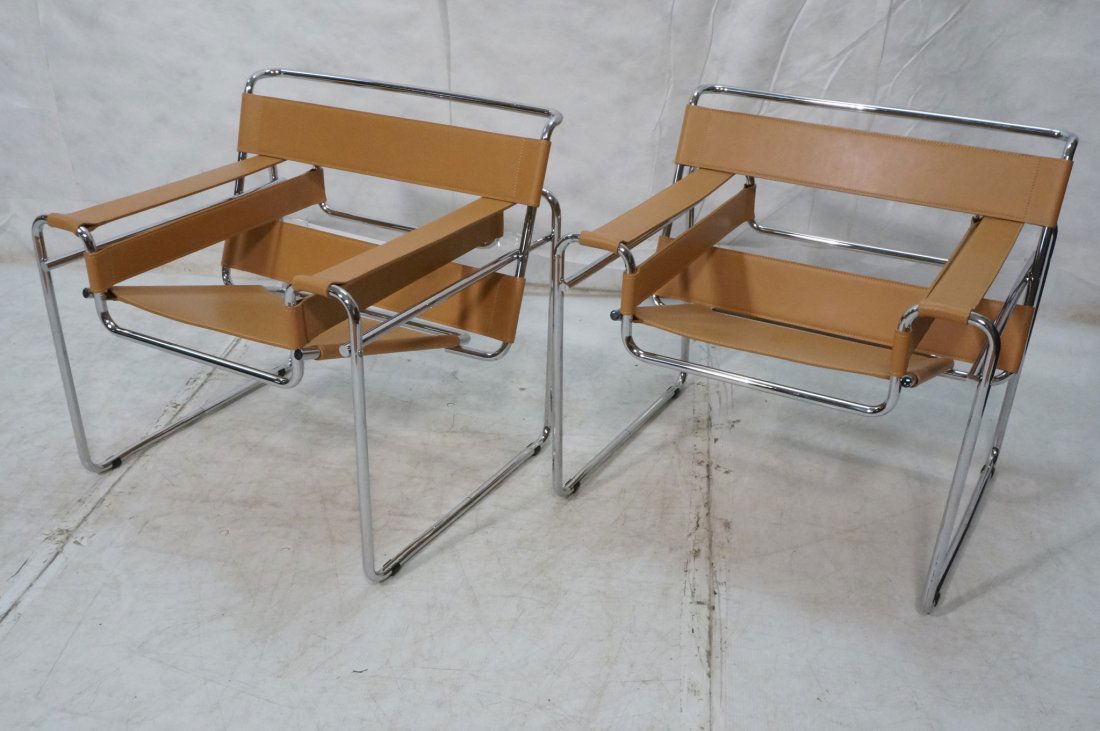 Pr Tan Leather WASSILY Lounge Chairs. MARCEL BREU: Pr Tan Leather WASSILY Lounge Chairs. MARCEL BREUER. Chrome tube frames. Unknown maker.-- Dimensions: H: 28.5 inches: W: 31 inches: D: 28.5 inches ---