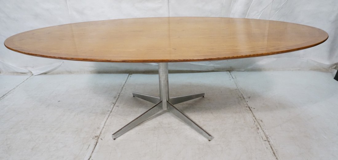 KNOLL Oval Oak Dining Conference Table. Heavy KNO: KNOLL Oval Oak Dining Conference Table. Heavy KNOLL chrome pedestal base with four feet. Custom made beveled edge banded top. -- Dimensions: H: 28 inches: W: 88 inches: D: 51.5 inches ---