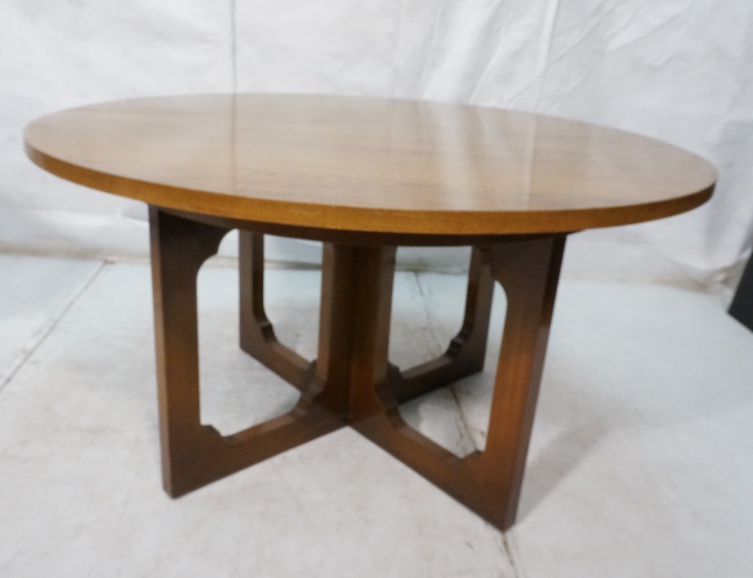 HARVEY PROBBER Style Round Walnut Dining Table. A: HARVEY PROBBER Style Round Walnut Dining Table. American Modern. Thick top on cut out base with skirt. Two 23.75" leaves.-- Dimensions: H: 29.25 inches: W: 54.25 inches: D: 54.25 inches ---