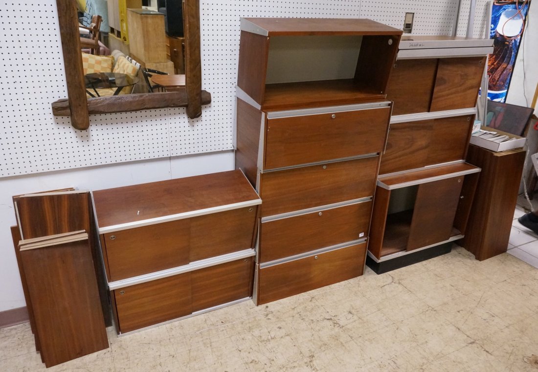 HERMAN MILLER Shelf Wall Unit CSS. Large set. Geo: HERMAN MILLER Shelf Wall Unit CSS. Large set. George Nelson. 4 note shelves. 1 large floor sliding door cabinet . 5 drop fronts (one missing front). 4 sliding door cabinets. 35 shelves. 4 Aluminum Ver