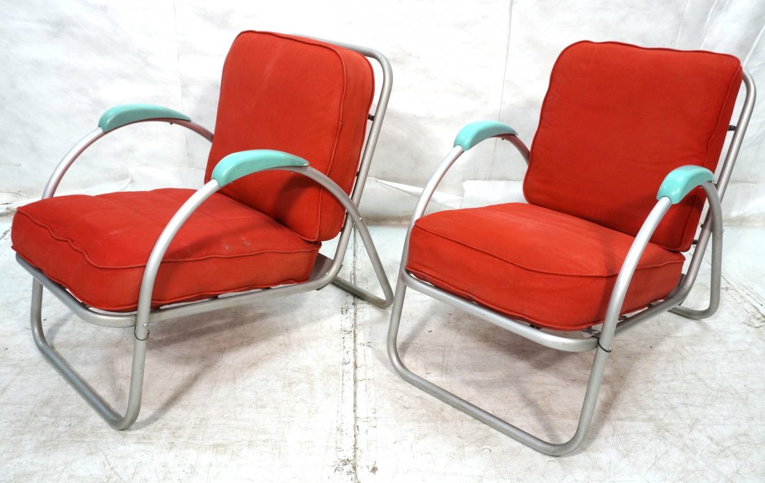 Pr Art Deco Tube Club Chairs. Red Cushions. Aqua: Pr Art Deco Tube Club Chairs. Red Cushions. Aqua plastic arm rests. HALLIBURTON Aluminum furniture.-- Dimensions: H: 30 inches: W: 23 inches: D: 35 inches ---