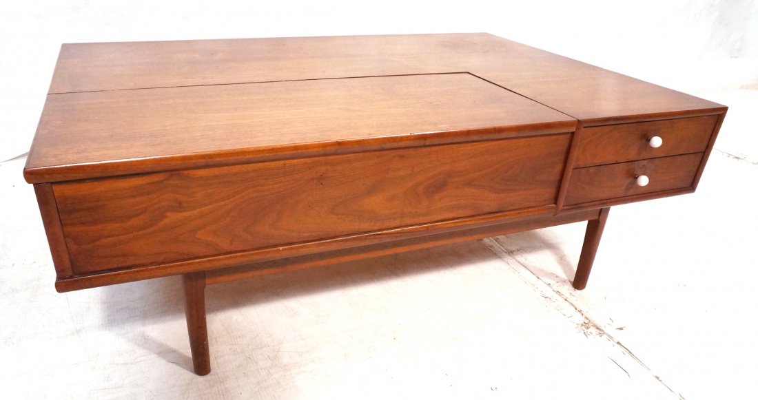 DREXEL American Modern Walnut Coffee Table. Part: DREXEL American Modern Walnut Coffee Table. Part of top lifts off for storage. Bookcase back. White porc. knobs-- Dimensions: H: 16.25 inches: W: 46 inches: D: 32 inches ---