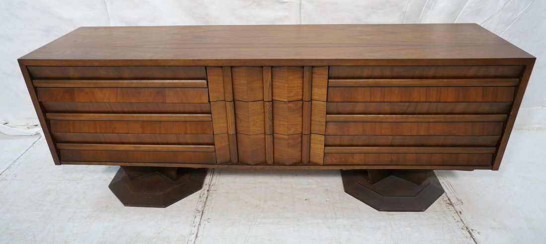 American Modern Sculpted Front Dresser Credenza &: American Modern Sculpted Front Dresser Credenza & Mirror. Walnut cabinet with nine drawers. Wood hardware. Double pedestal base. -- Dimensions: H: 31 inches: D: 20.75 inches: L: 80 inches ---