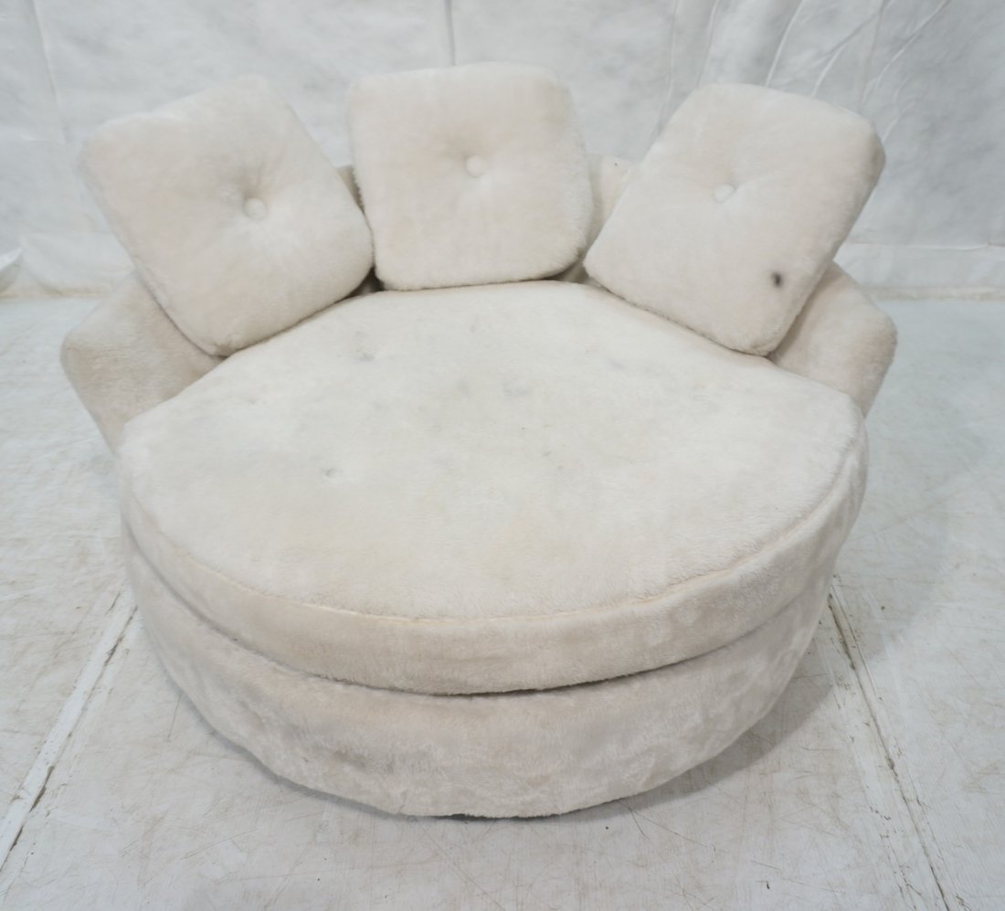 ADRIAN PEARSALL style Round White Lounge Chair. W: ADRIAN PEARSALL style Round White Lounge Chair. White pile fabric upholstery. Wood legs. Extra pillows. Marked made in Nelson of Kingston.-- Dimensions: H: 25 inches: W: 50.5 inches: D: 46 inches ---