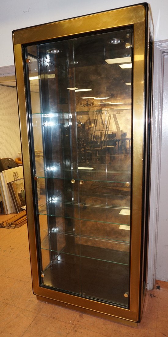 MASTERCRAFT Display Etagere Cabinet. Brass Bound: MASTERCRAFT Display Etagere Cabinet. Brass Bound Ebonized Frames. Two Glass Doors & Sides. Antiqued Smoked Mirrored Backs.-- Dimensions: H: 84.5 inches: W: 36 inches: D: 16 inches ---