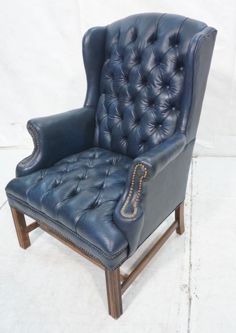 Navy Blue Leather Chesterfield style Wing Chair.