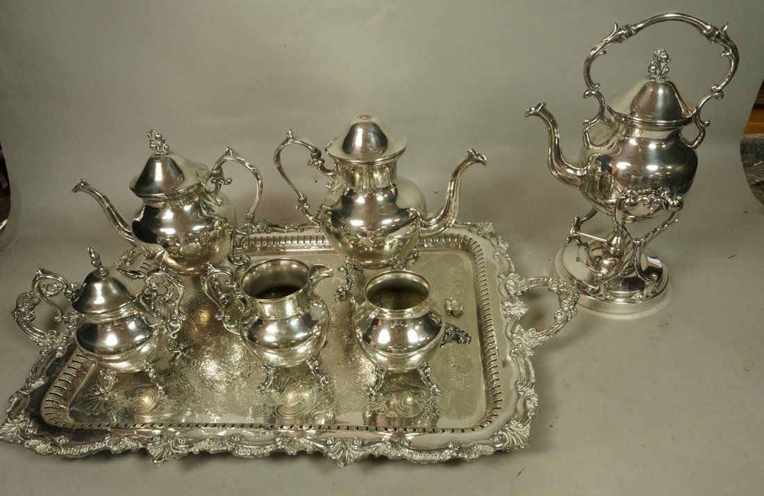 7pc Silver Plate Tea Set & Tray. Marked Silver on: 7pc Silver Plate Tea Set & Tray. Marked Silver on Copper. Includes Tilting Teapot. Fancy decoration. -- Dimensions: ---