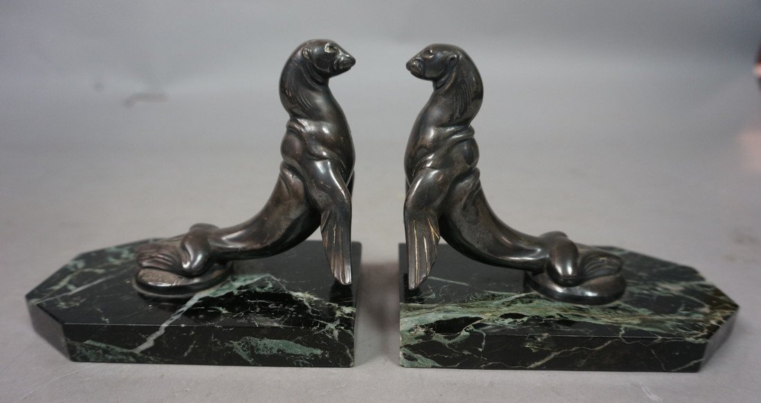 Pr FRECOURT Seal Bookends. French ART DECO Booken: Pr FRECOURT Seal Bookends. French ART DECO Bookends. Marble Base with stylized Metal Seals. Signed Frecourt, France.-- Dimensions: H: 4.25 inches: W: 5.25 inches: D: 3.25 inches --- US Shipping charge
