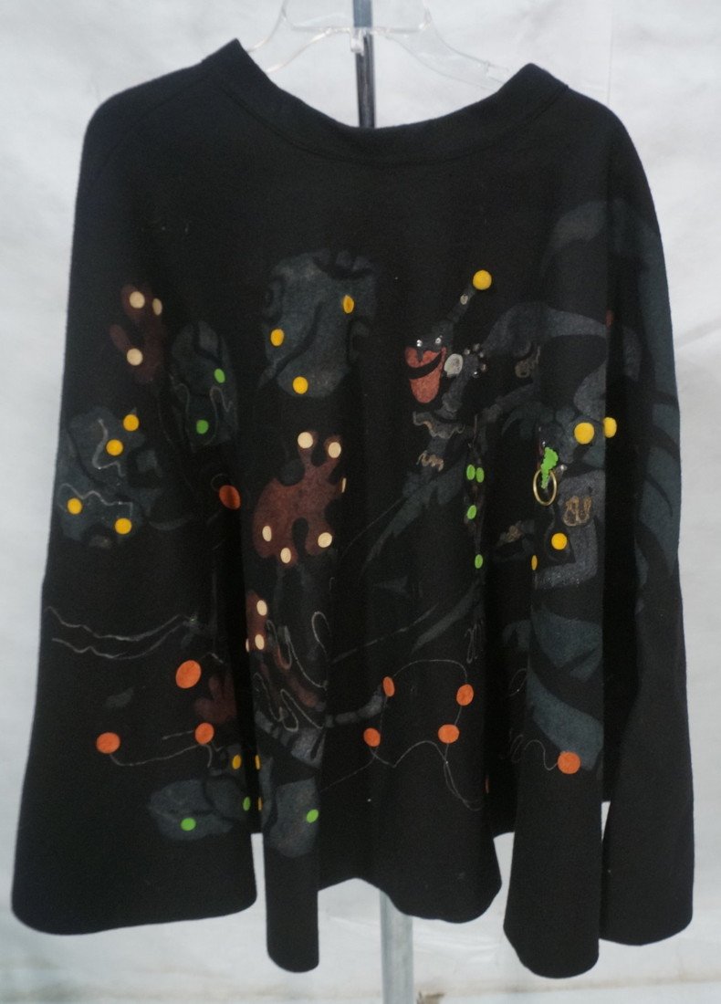 Vintage Heavy Black Felt Flared Skirt. Painted Ju: Vintage Heavy Black Felt Flared Skirt. Painted Jungle Scene with tigers, Flora & Nubian caricature style Figures. Applied felt details. Small 24" waist. zipper and hook & eye closure. No label.-- Dime