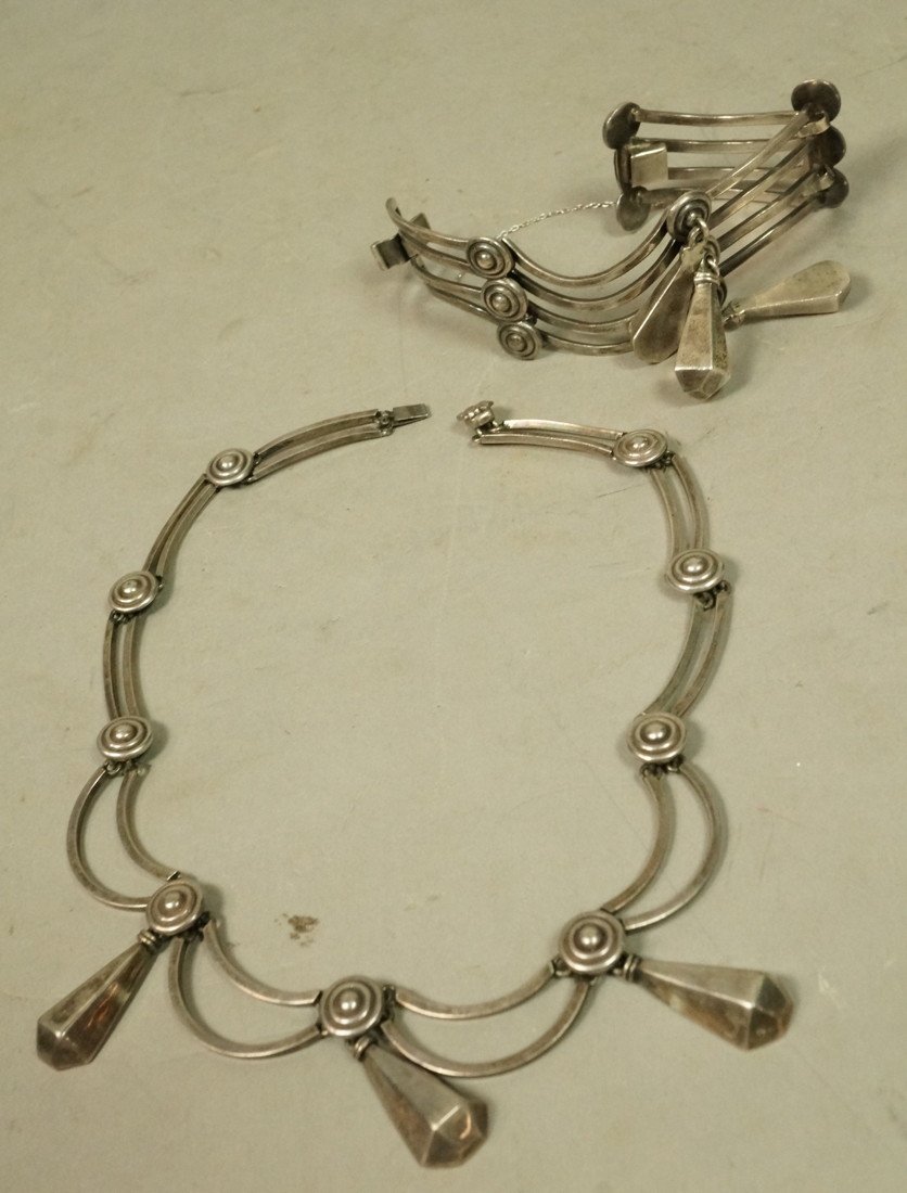 2pc Mexican Sterling LOS CASTILLO Necklace Bracel: 2pc Mexican Sterling LOS CASTILLO Necklace Bracelet. Three pendants dangle from double draped sterling necklace. Bracelet has four wavy bands with three dangles. Both marked. Made in Mexico, 788A & 78
