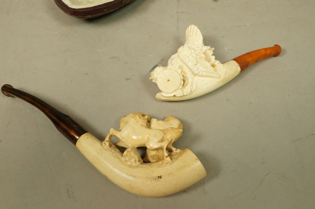 2pcs Carved Meerschaum Pipes. Turkey with box no: 2pcs Carved Meerschaum Pipes. Turkey with box no top and 1 with carved horses.-- Dimensions: H: 2 inches: W: 5.25 inches --- US Shipping charge: $20