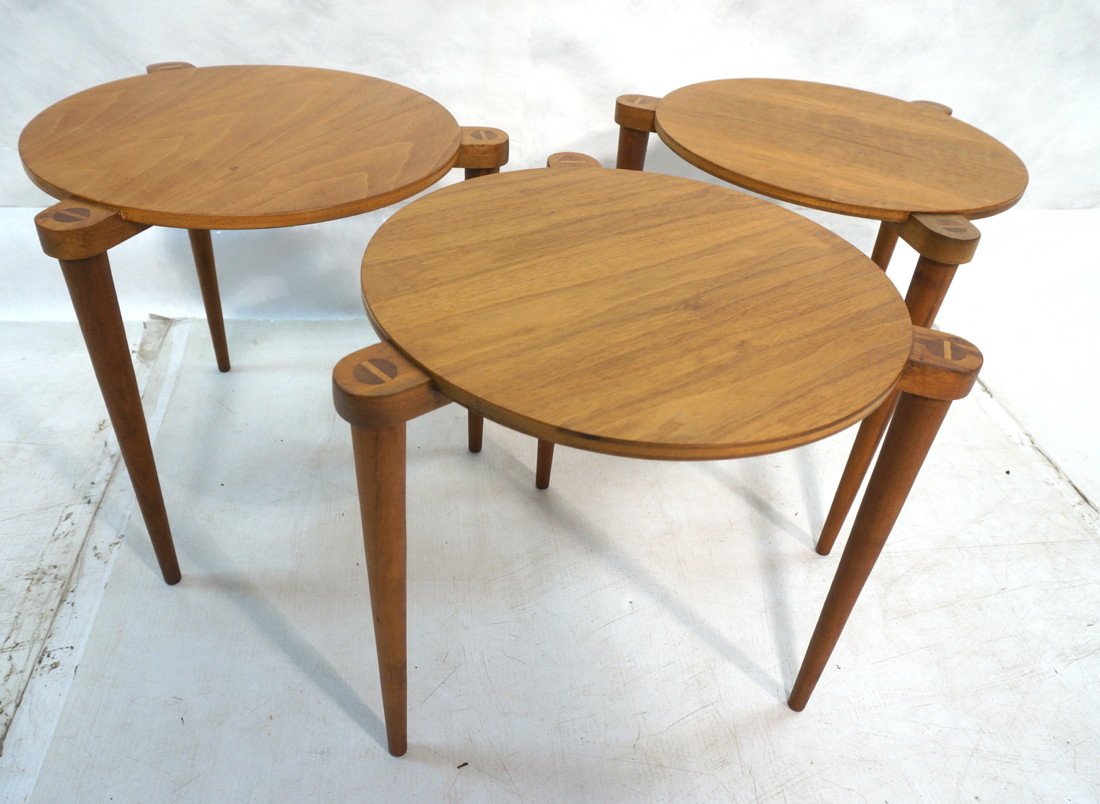 Set Three Round Nesting Tables. Each with three p: Set Three Round Nesting Tables. Each with three peg legs in extended supports. Not marked. -- Dimensions: H: 19 inches: W: 17.5 inches: D: 17.5 inches ---