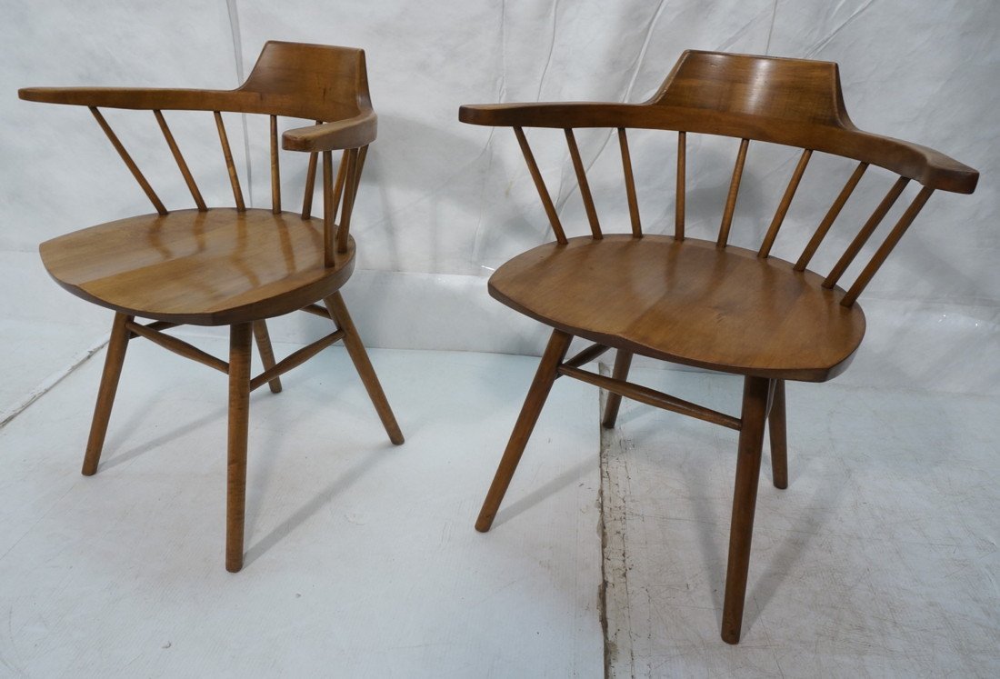 Pair Nakashima for Knoll Captain Chairs. Tapered: Pair Nakashima for Knoll Captain Chairs. Tapered legs. Plank seats. Unmarked.-- Dimensions: H: 29 inches: W: 26.75 inches: D: 20 inches ---