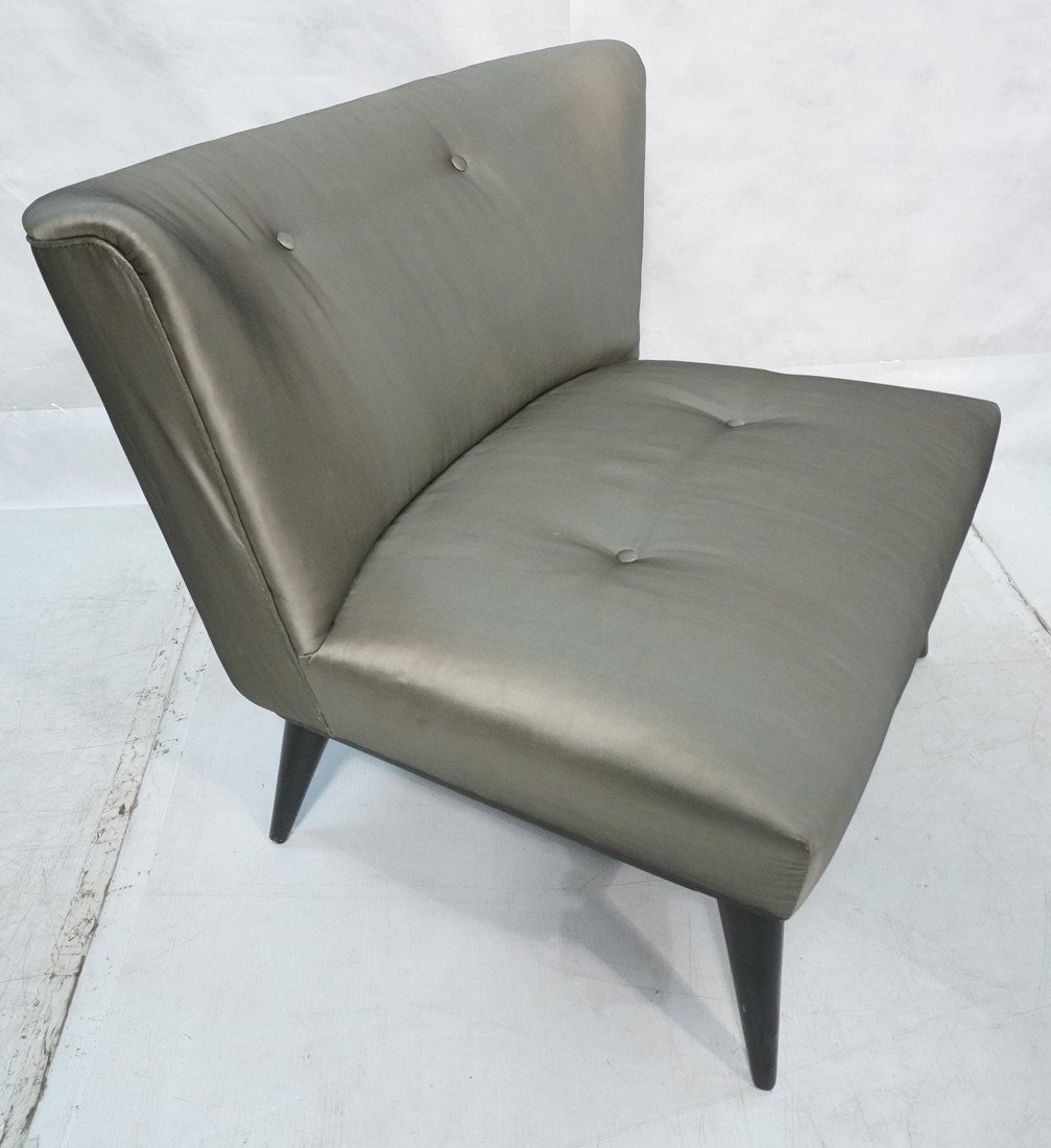 Modern Lounge Chair. Shiny Charcoal Fabric Uphols: Modern Lounge Chair. Shiny Charcoal Fabric Upholstery. Black frame with tapered peg legs. Not marked-- Dimensions: H: 30 inches: W: 31.5 inches: D: 26 inches ---