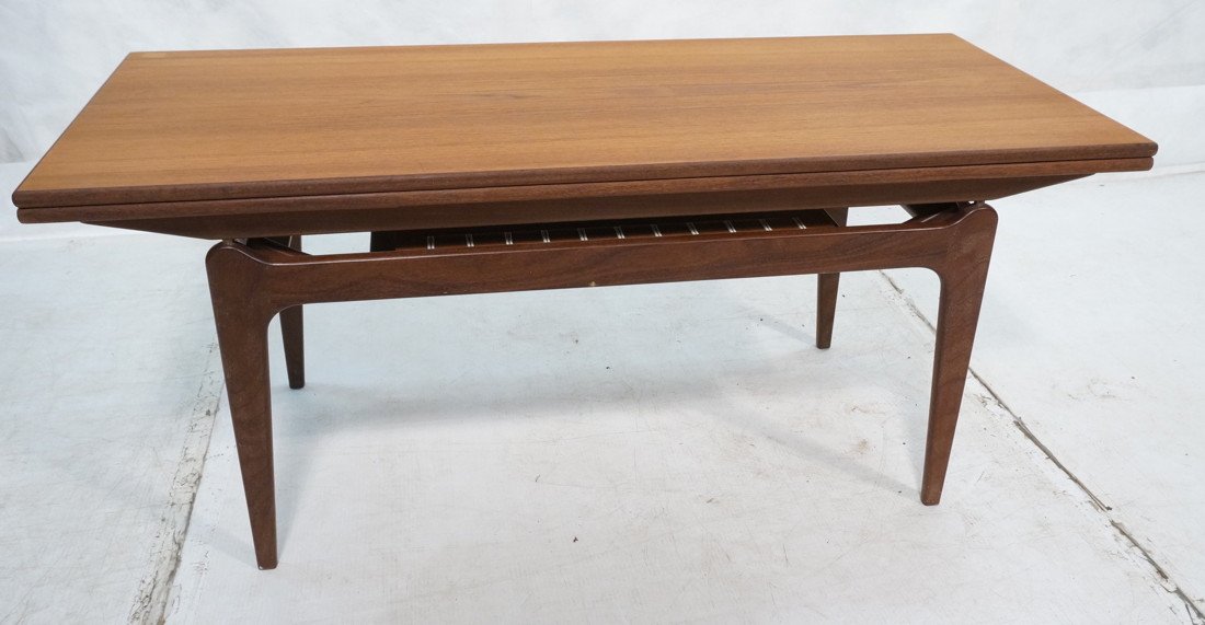 Danish Modernist Teak Convertible Coffee Table.: Danish Modernist Teak Convertible Coffee Table. Cocktail table converts into dining table. Raises up in height and flips open to form higher larger dining table. Not marked. -- Dimensions: H: 21.25 in