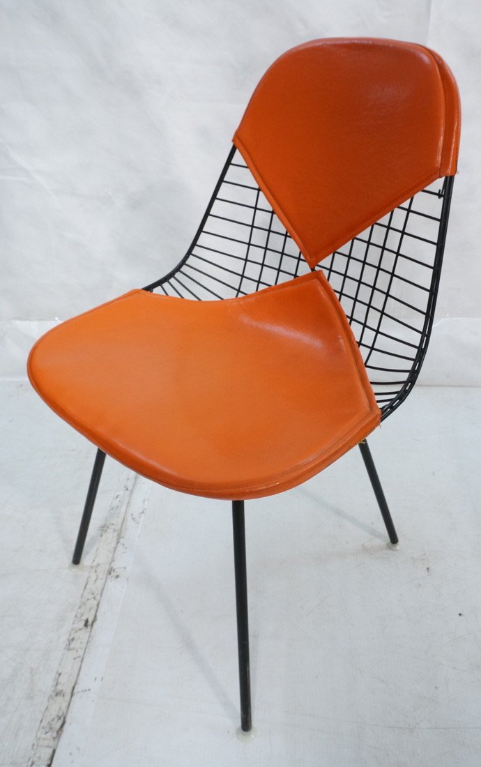 CHARLES EAMES for HERMAN MILLER Bikini Chair. Ora: CHARLES EAMES for HERMAN MILLER Bikini Chair. Orange Bikini cushions. Label-- Dimensions: H: 32.25 inches: W: 19 inches: D: 21 inches ---