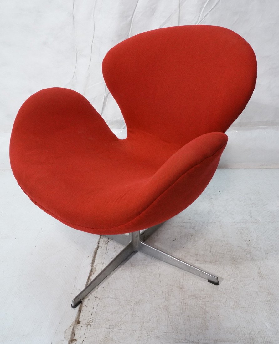 FRITZ HANSEN Swan Lounge Chair. ARNE JACOBSEN. Re: FRITZ HANSEN Swan Lounge Chair. ARNE JACOBSEN. Red fabric upholstery. Marked F.H.-- Dimensions: H: 30 inches: W: 30 inches: D: 29 inches ---