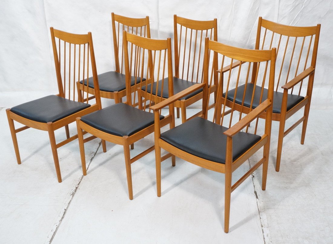 Set 6 ARNE VODDER Dining Chairs. Two Arms & 4 Sid: Set 6 ARNE VODDER Dining Chairs. Two Arms & 4 Side Chairs with thin spindle backs. Arched rail. Black leather seats. SEIBAST Label.-- Dimensions: H: 38.5 inches: W: 22.25 inches: D: 20.5 inches ---