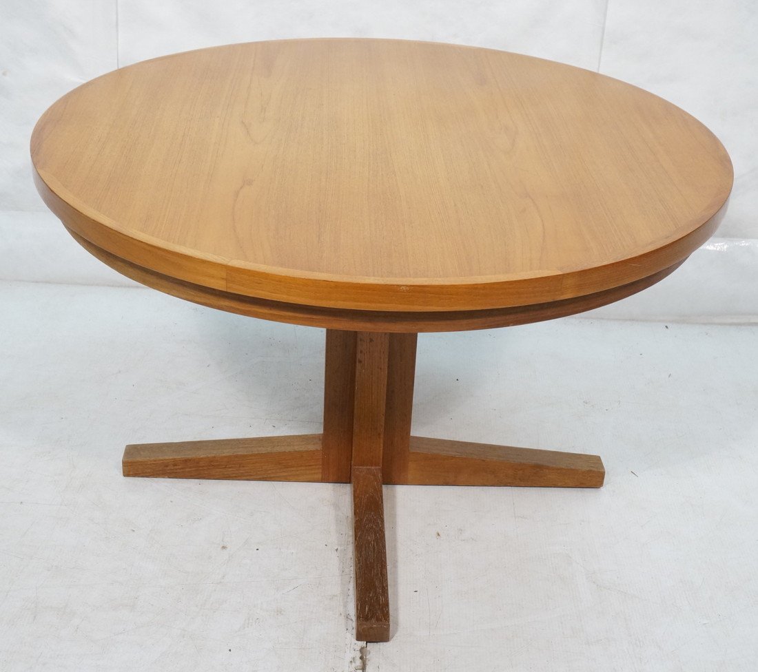 DYRLUND Danish Teak Dining Table. Unique Round Re: DYRLUND Danish Teak Dining Table. Unique Round Refractory Table. Lift Out Leaves flip open so table remains round when leaves are used. Marked-- Dimensions: H: 28 inches: W: 45 inches: D: 45 inches --