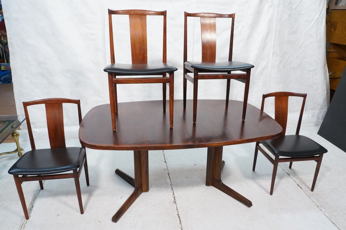Rosewood Danish Modern Dining Set. Table. 4 Chair: Rosewood Danish Modern Dining Set. Table. 4 Chairs. Asian inspired Chairs; black seat cushions.-- Dimensions: H: 28.25 inches: W: 62 inches: D: 41.5 inches ---