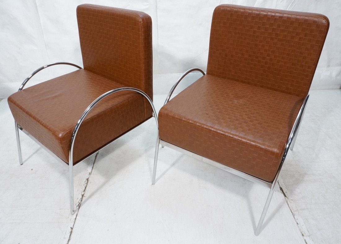Pr Oversized Contemporary Lounge Chairs. Brown le: Pr Oversized Contemporary Lounge Chairs. Brown leather with chrome tube frames. -- Dimensions: H: 38 inches: W: 28 inches: D: 28 inches ---