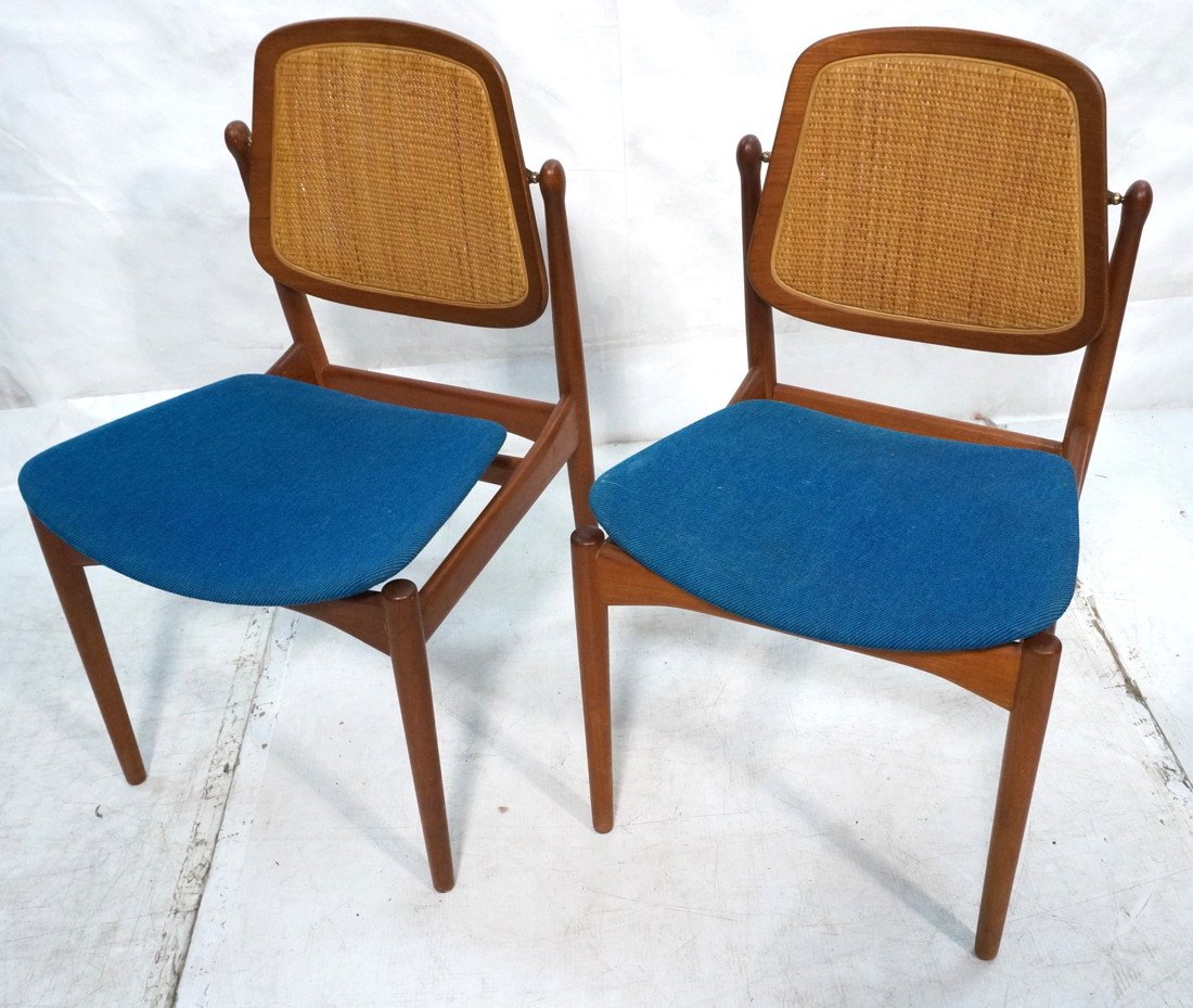 Pr Caned Back Side Chairs. Teak Danish Modern. Te: Pr Caned Back Side Chairs. Teak Danish Modern. Teal upholstered seats. Metal FD Tag-- Dimensions: H: 34 inches: W: 20 inches: D: 20 inches ---