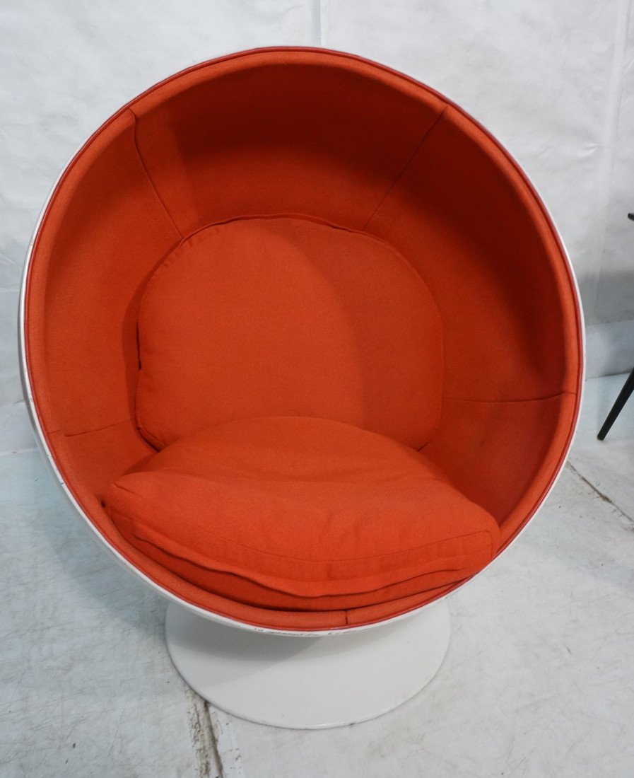 70's Modern Ball Chair. EERO AARNIO style. Molded: 70's Modern Ball Chair. EERO AARNIO style. Molded white ball frame with red fabric lined interior and cushions. -- Dimensions: H: 48 inches: W: 39 inches: D: 29 inches ---