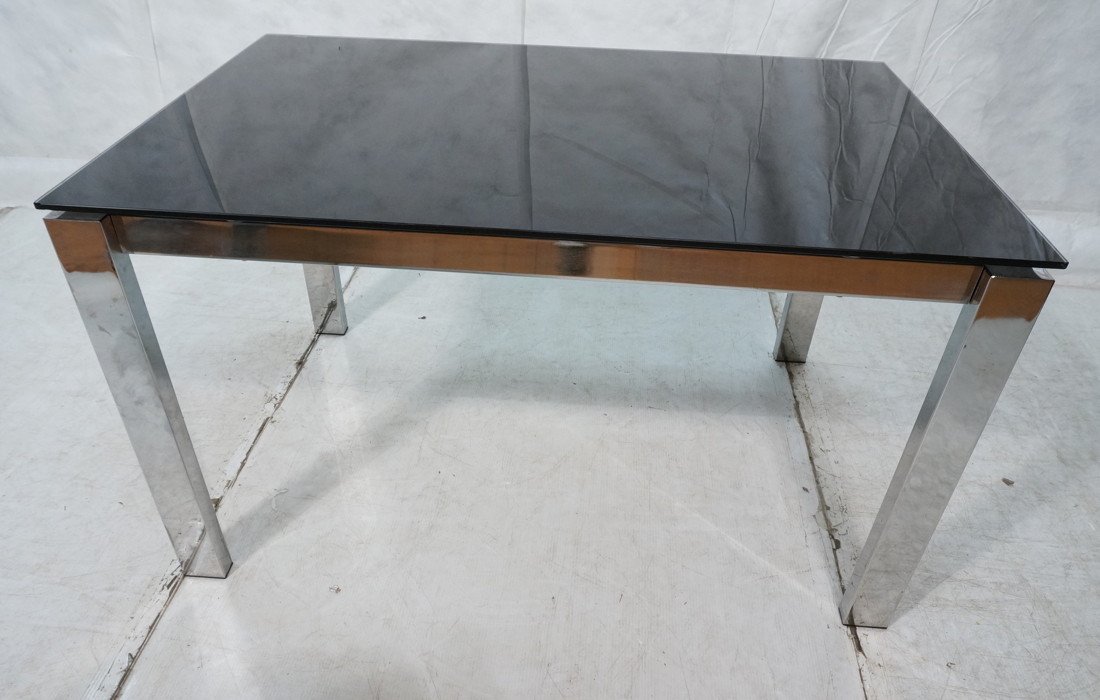 Chrome Rectangular Dining Table. Black Glass Top.: Chrome Rectangular Dining Table. Black Glass Top. Hidden Glass Leaves. Thick chrome square column legs.-- Dimensions: H: 29.75 inches: W: 33.5 inches: D: 51.25 inches ---