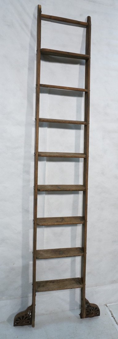 Vintage Industrial Wood Ladder with Wheels. Libra: Vintage Industrial Wood Ladder with Wheels. Library style. Putnam & Makers.-- Dimensions: H: 105 inches: W: 32 inches ---
