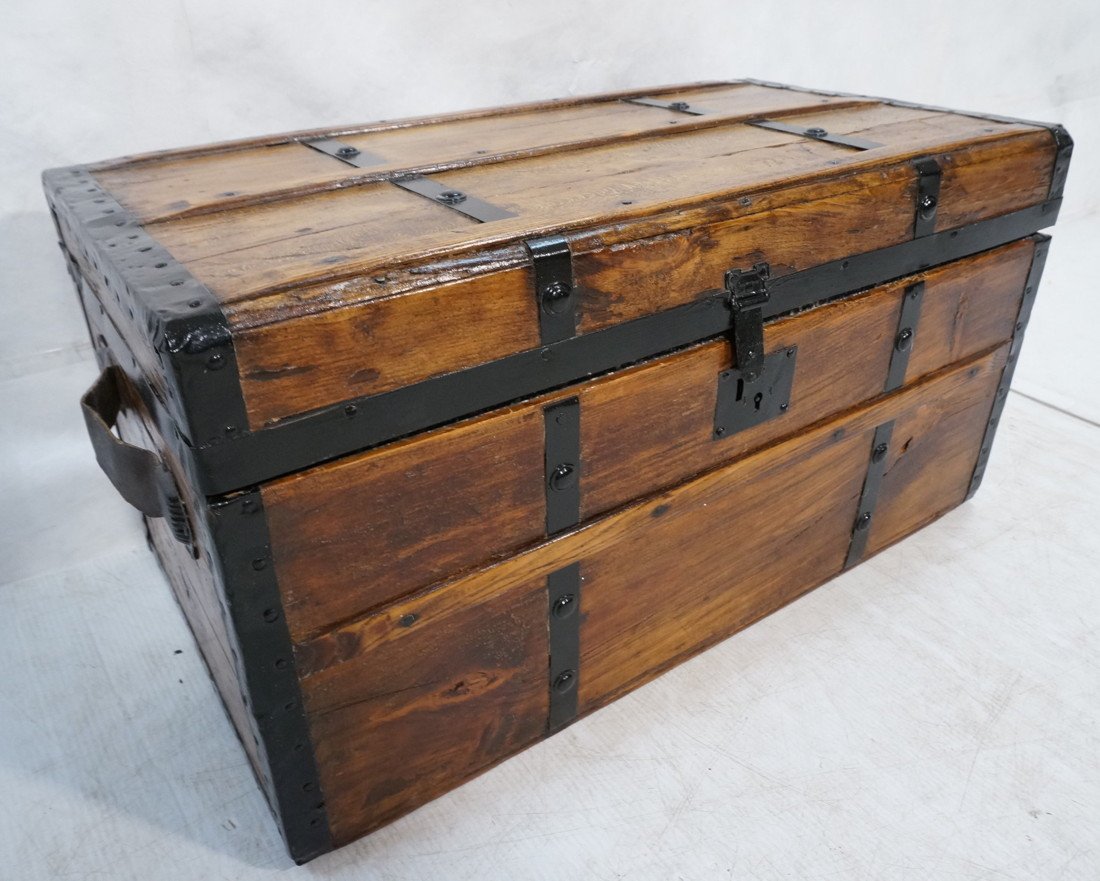 Antique wooden chest. Black metal straps. Leather: Antique wooden chest. Black metal straps. Leather handles. Refinished. Flat top. Fitted, upholstered interior. -- Dimensions: H: 15 inches: W: 28 1/4 inches: D: 16 inches ---