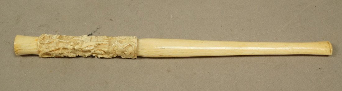 Carved ivory cigarette holder. Carved dragon desi: Carved ivory cigarette holder. Carved dragon design.-- Dimensions: : L: 6.75 inches --- US Shipping charge: $9
