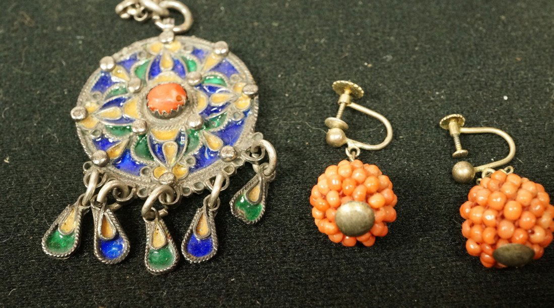 2pc ethnic jewelry. Pair of Asian earrings with c: 2pc ethnic jewelry. Pair of Asian earrings with coral seed beads. Marked 835. Silver and enamel coral bead pendant necklace with decorative link silver chain. Pendant is 2.5" long.-- Dimensions: : L: