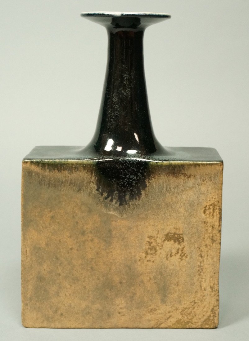 Italian GAMBONE Art Pottery Vase. Square form ves: Italian GAMBONE Art Pottery Vase. Square form vessel with tall flared neck. Interesting matte glaze base with contrasting high glaze neck. Signed-- Dimensions: H: 9.5 inches: W: 6 inches: D: 2.5 inche