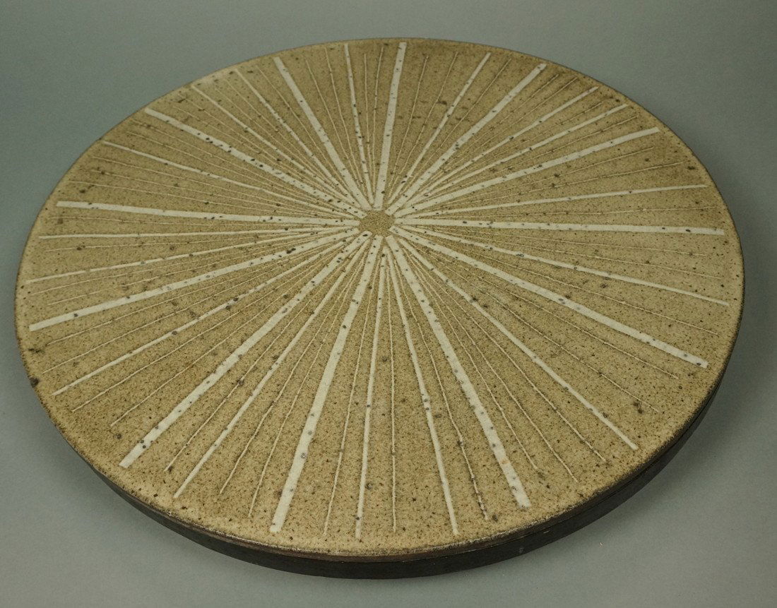 Modernist Art Pottery Marshall Studios MARTZ Lazy: Modernist Art Pottery Marshall Studios MARTZ Lazy Susan. Starburst incised design in ceramic disc. Not marked.-- Dimensions: H: 18.25 inches: D: 3 inches ---