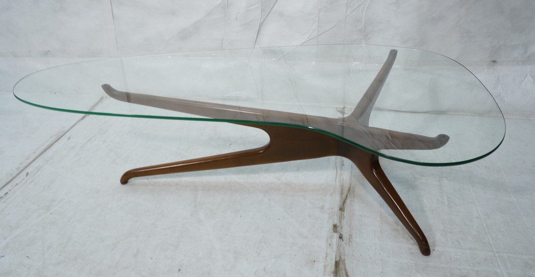 VLADIMIR KAGAN Glass Top Coffee Table. American M: VLADIMIR KAGAN Glass Top Coffee Table. American Modern Walnut Base Cocktail Table. Shaped Glass Top. -- Dimensions: H: 16 inches: W: 59.5 inches: D: 36 inches ---